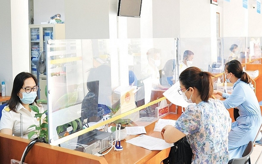 Nhiệm vụ thu ngân sách năm 2022 của ngành Thuế là 1.174.900 tỷ đồng. 	Ảnh: TCT